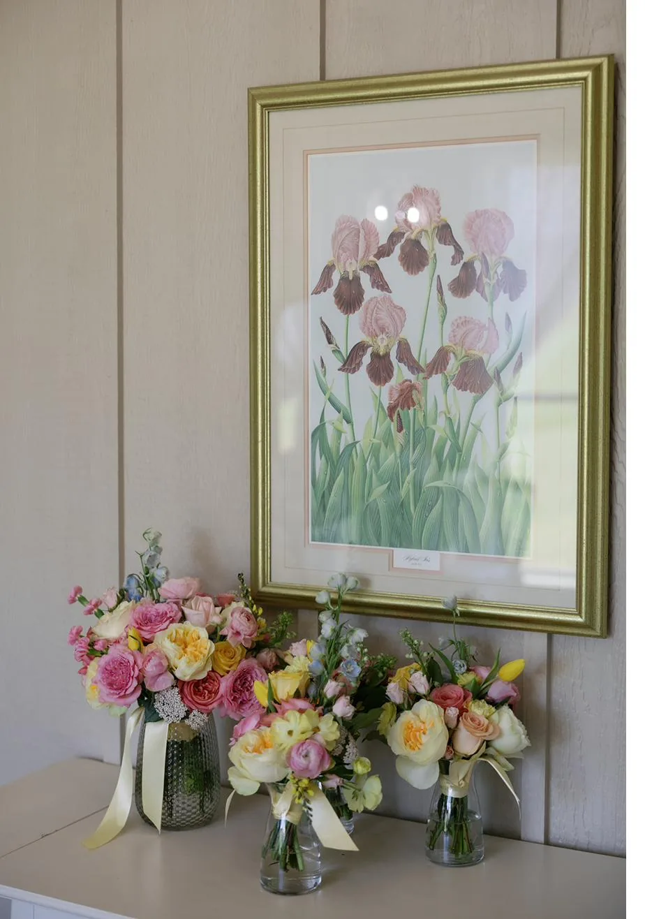 Wedding florals and framed art detail at Gateley Hill Gardens
