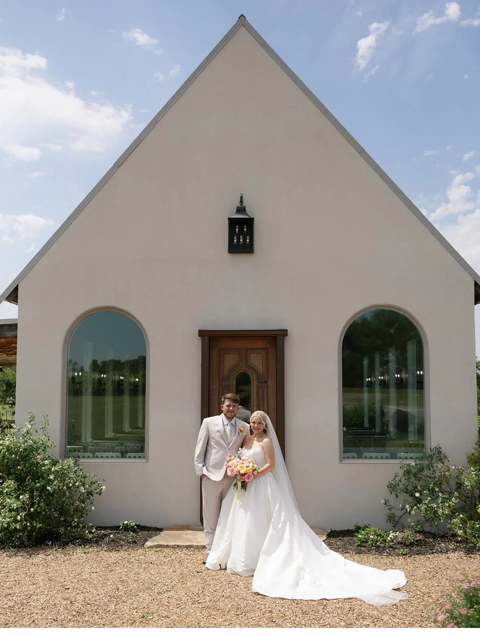 Bailey and Titus portrait by the chapel at Gateley Hill Gardens