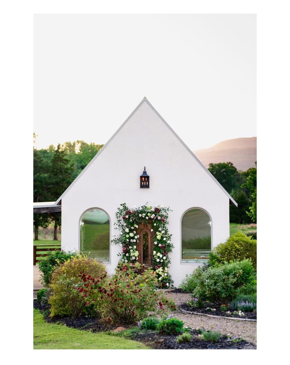 Gateley Hill Gardens chapel with burgundy floral archway