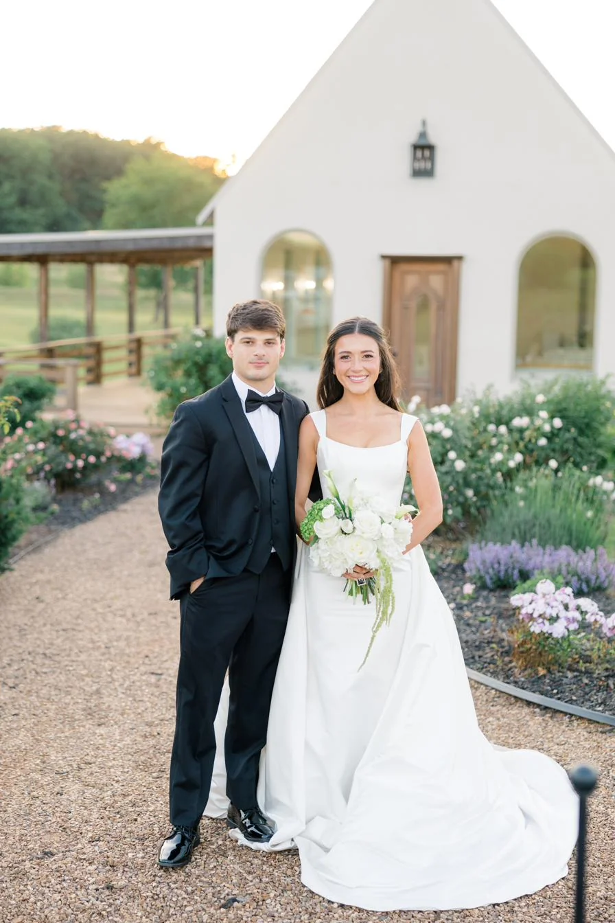 Olivia and Dax golden hour portrait at the Gateley Hill chapel exterior