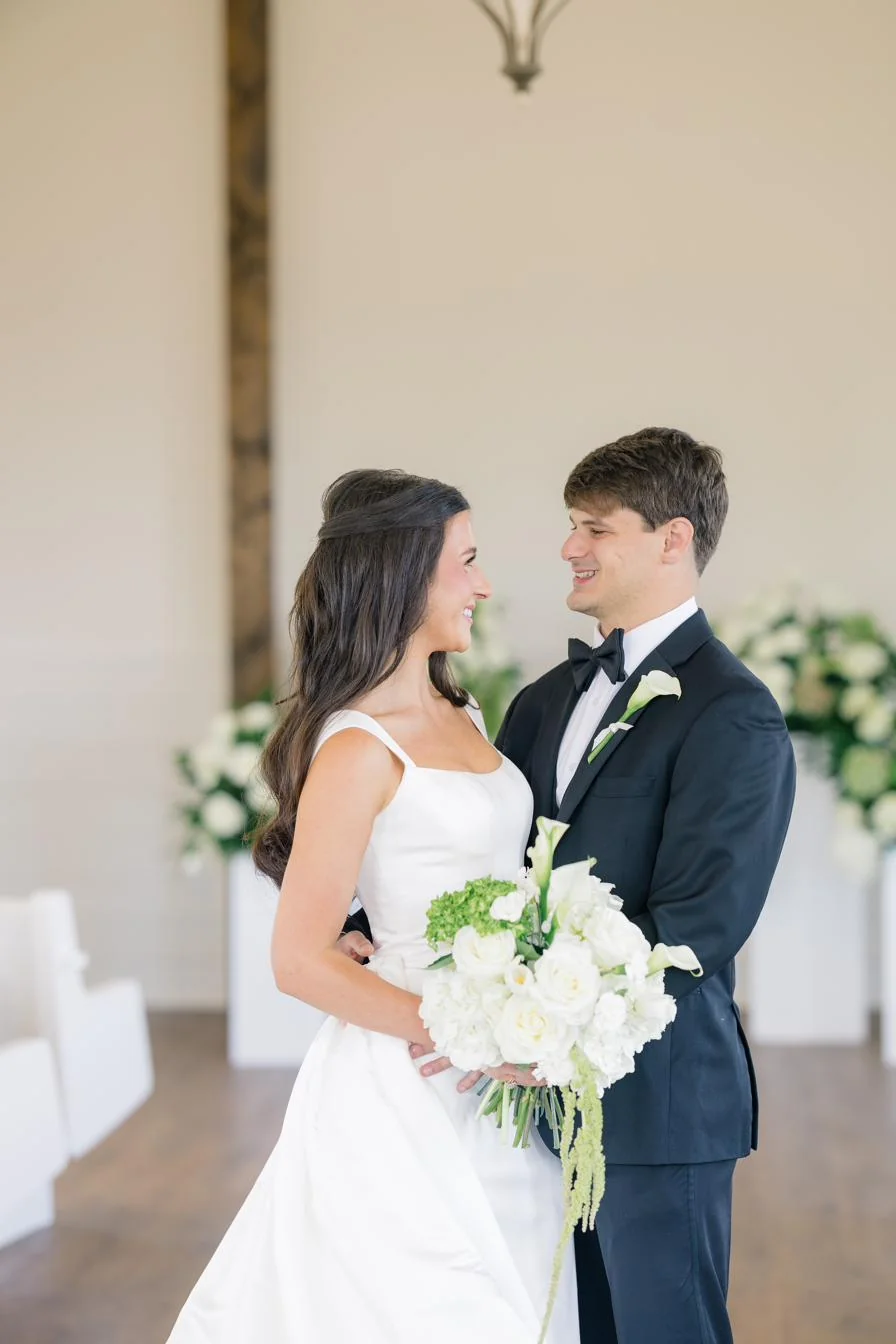 Bride Olivia with her bouquet at Gateley Hill chapel